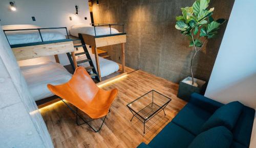 Deluxe Room with Shower (2 Double Beds and 2 Single Beds) - Non-Smoking - No Cleaning for Consecutive Night Stays