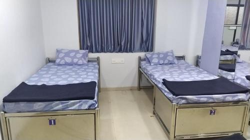 Single Bed in Male Dormitory Room