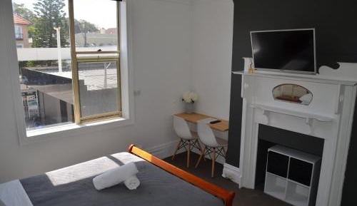 Queen Room with Shared Bathroom