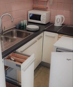 Quadruple Room with Kitchen and Balcony