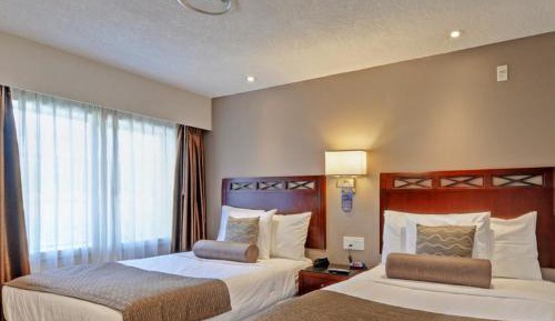 One Bedroom Suite with Two Double Beds & Sofa Bed