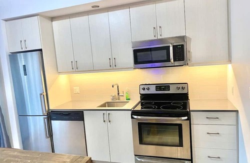 Cite Multimedia Apartment | Pretty studio in Old Port Montreal with charming decor and a fantastic location.