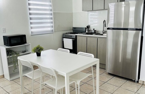 Celada Apartment | Tropical 2BR Apt +Priv Bath and Parking in Gurabo