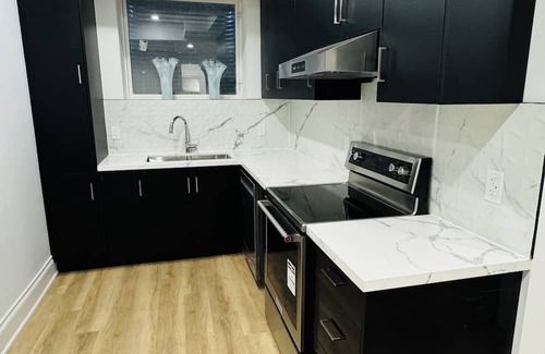 Caledon House | Experience modern luxury and comfort in our charming two bedroom apartment!