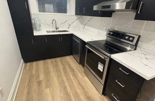 Caledon House | Experience modern luxury and comfort in our charming two bedroom apartment!