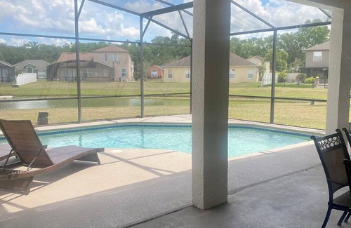 Kissimmee House | Charming 3-bedroom house with AC, fitness room, WiFi in Kissimmee