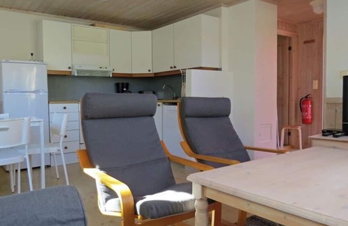 Spangereid House | Holiday home "Ramsland Brygge 5", on the fjord Ramslandsvågen near Ramsland, Spangereid-Lindesnes, southern Norway, max 4 adults child, 2 bedrooms, 1 bathroom, boat mooring at the jetty in front of the house, terrace at the house, final cleaning .