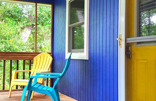 Colington Harbour House | OBX Treehouse - cozy 2-bedroom house with hot tub and WiFi in quiet neighborhood
