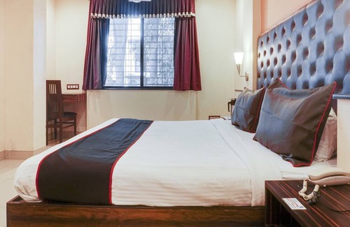 Shivajinagar Hotel | Capital O Hotel Span Executive