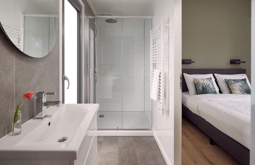 Lattrop House | The Amalia 4 Eco is a luxurious holiday home with a private sauna, a spacious living room, open kitchen, two bedrooms and a spacious patio.