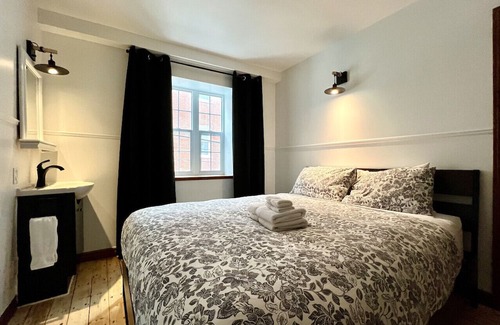 Saint-Jean-Baptiste Apartment | Nice condo with mezzanine floor and terrace.