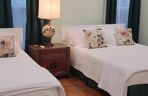 Titusville Bed & Breakfast | Great solar eclipse viewing! Beautiful room, 2 queen beds & private bath.