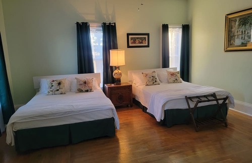 Titusville Bed & Breakfast | Great solar eclipse viewing! Beautiful room, 2 queen beds & private bath.