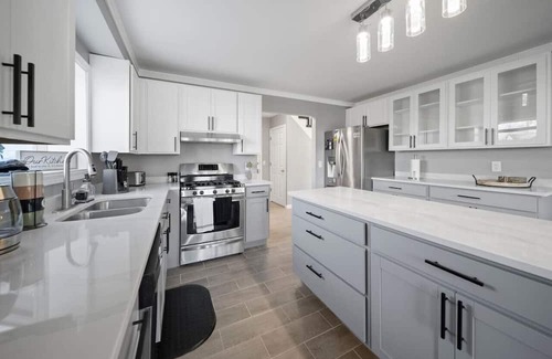 Chesterfield House | Elegant Oasis: 4-Bedroom Home Away from Home