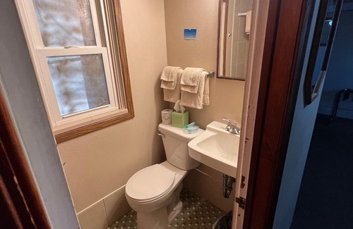 Onalaska House | Overlooking Lake Onalaska - Two full-size beds + bath in nostalgic motel