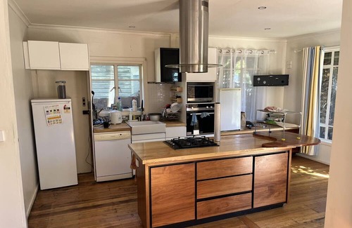 Frankston House | One master bedroom with own bathroom, the other one a bedroom with shared bath.