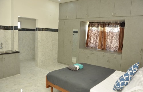 Thanjavur House | Roof-top stay in a new-built house in the centre of city.