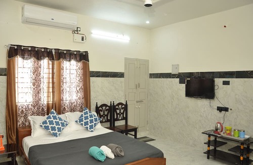 Thanjavur House | Roof-top stay in a new-built house in the centre of city.