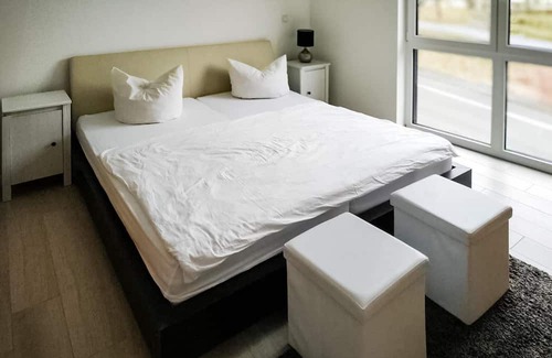 Mehring Apartment | This modern vacation apartment not far from the Moselle welcomes you with a wonderful view of the co