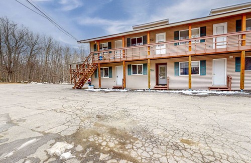 Greenville Junction Condo | First-floor condo near lake/skiing/hiking with beach access, lake view & patio