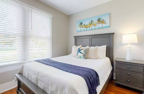 Galveston Cabin | Centrally located unit with shared courtyard, designated hot tub, & fire pit!