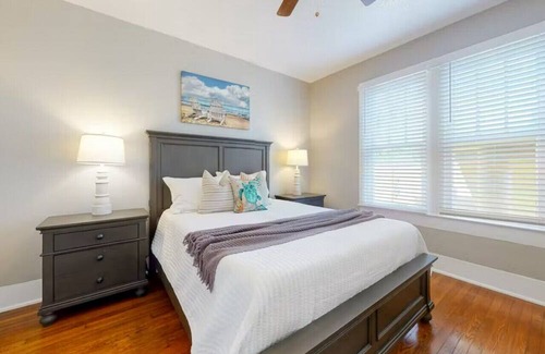 Galveston Cabin | Centrally located unit with shared courtyard, designated hot tub, & fire pit!