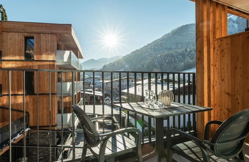 Kirchberg in Tirol Apartment | Cosy apartment for 4 guests with WIFI, pool, TV and terrace