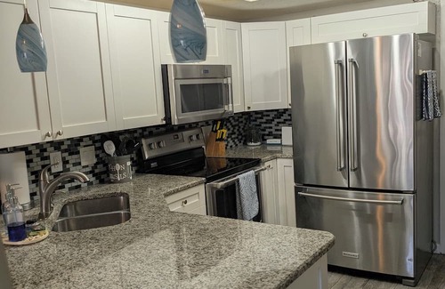 Lutz Condo | Shore to Please - Luxury 2BR Condo, Two-Story Beach Décor - Clothing Optional