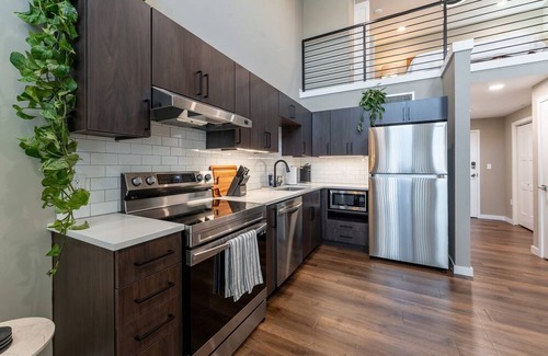 Springfield Apartment | Elevate Your Stay in Our Stunning Loft with 17-Foot Ceilings