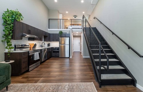 Springfield Apartment | Elevate Your Stay in Our Stunning Loft with 17-Foot Ceilings