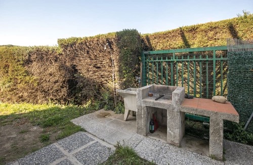 Lacona Apartment | On the ground floor and with an equipped veranda, it consists of a small living room with kitchen co