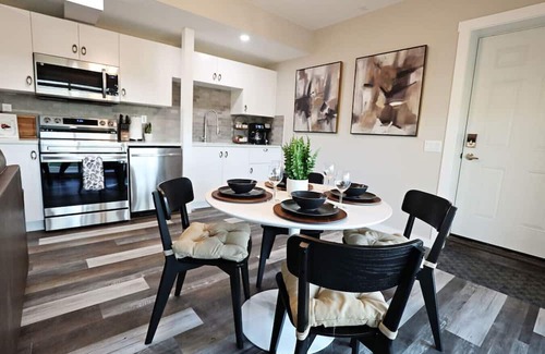 Southeast Calgary Condo | Mahogany Lakefront 2BR Walkout | Trails & Privacy