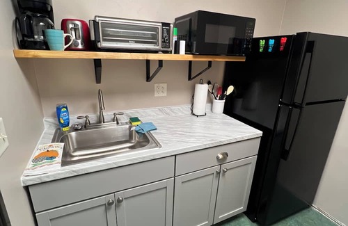 Pershing House | Family-Friendly Nebraska Estate with Scenic Pool, Gym, Theater & Fire Pit Fun