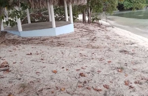 Little Bay Cottage | Fruit Tree Beach Cottage, Bar and Grill with private beach and beautiful sunsets