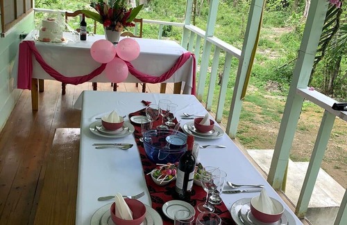 Little Bay Cottage | Fruit Tree Beach Cottage, Bar and Grill with private beach and beautiful sunsets