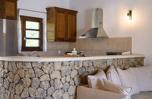 Kavvadades Villa | Dazzling Corfu Villa | Villa Emerald Horizon | 2 Bedrooms | Spacious Furnished Terrace with Shaded Outdoor Dining Area | Private Garden, Pool and Hot Tub | Prime Location | Arillas, Mega Lithari