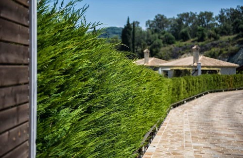 Kavvadades Villa | Alluring Corfu Villa | Villa Corallia | 2 Bedrooms | Spacious Furnished Terrace with Shaded Outdoor Dining Area | Private Garden, Pool and Hot Tub | Prime Location | Arillas, Mega Lithari