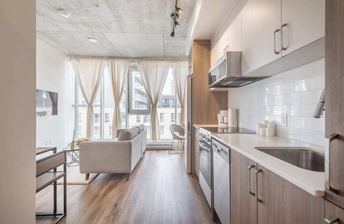 Shaughnessy Village Apartment | Concordia- Warm and Zen