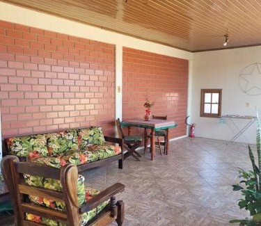 Harmonia Apartment | Studio com sacada, área de lazer e garagem.