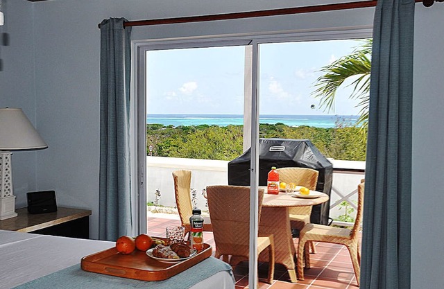 Spectacular ocean views, centrally located, and just off Grace Bay Beach