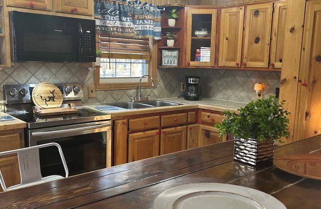 Charming 2-bedroom house with WiFi and AC with private drive and insulated shop.