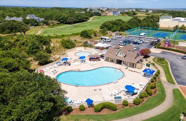 Soundside home in the Currituck Club with countless community amenities!