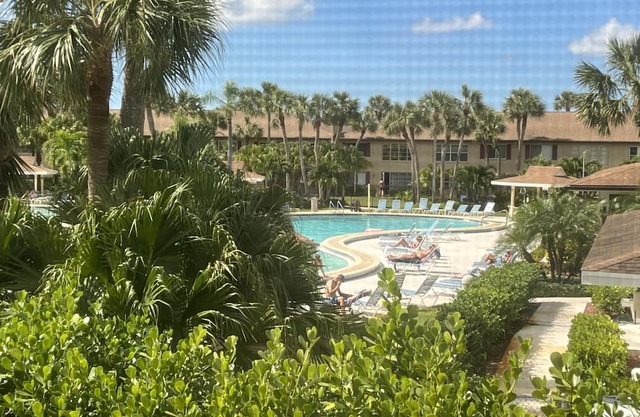 Condo overlooking resort pool, tennis, pickleball, clubhouse