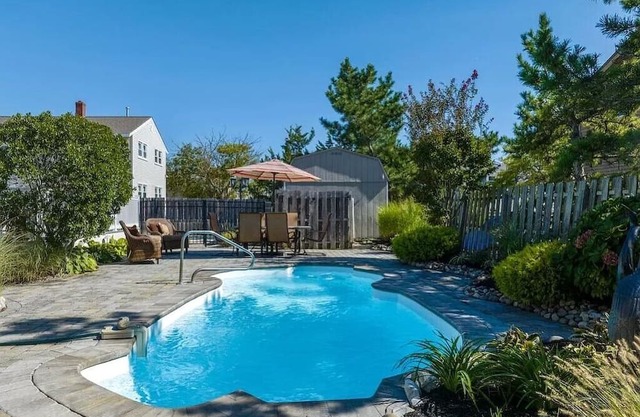 Back Yard Oasis with Heated in ground Salt water Pool! 2 blocks to the beach!