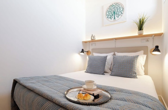Cozy T1 Flats with Courtyard BBQ by HostWise