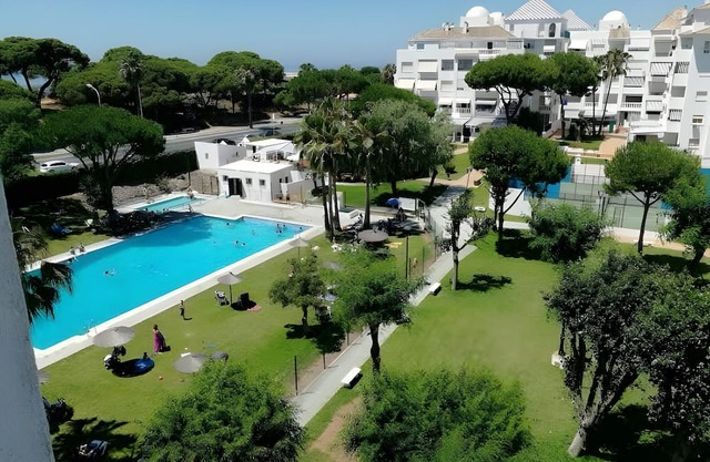 Apartment 'El Portil Pinares' with Shared Pool, Private Terrace and Wi-Fi