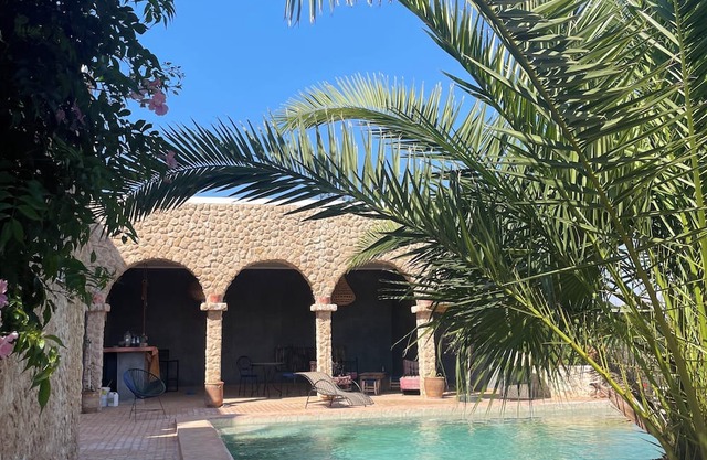 Villa M'Birika - with large swimming pool surrounded by olive and eucalyptus trees.