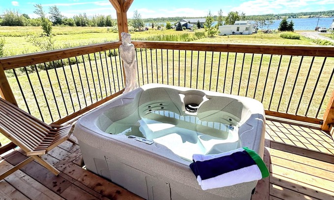 Sainte-Anne-de-Kent Cottage | Coastal Charm Meets Country Calm | Relaxing Cottage with Water Views & Hot Tub